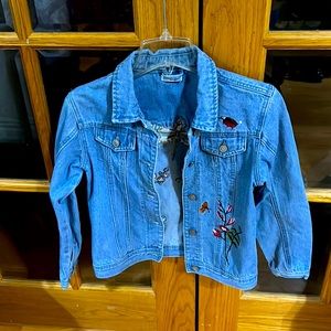 Pre-Owned Dex Girls, size L jean jacket with floral print.